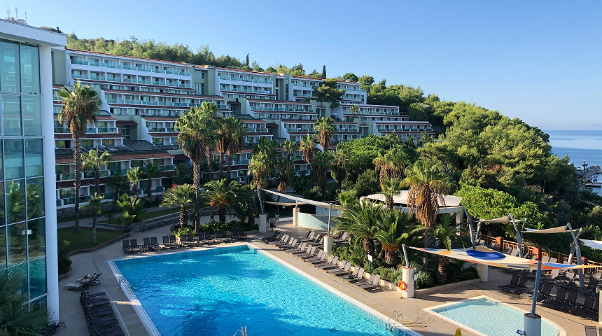 Deepsky Villa resort and swimming pool surrounded by tropical greenery