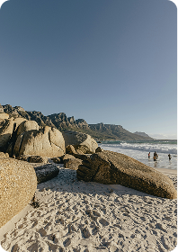 A peaceful sandy beach framed by granite rocks